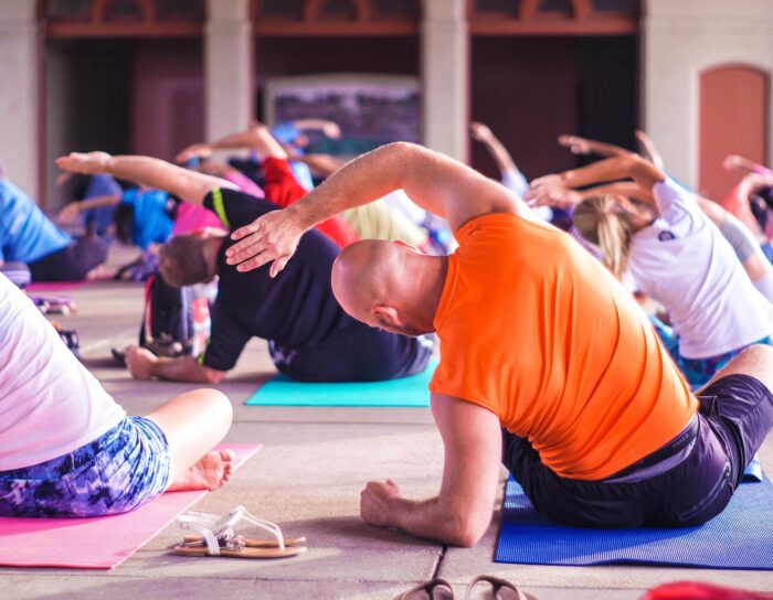 Yoga class of people stretching